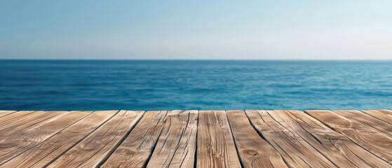 Obraz premium A wood table with a functional style overlooking a serene ocean view, emphasizing practicality and coastal beauty, banner, with copy space