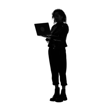 recommend clip art: Silhouette of young black woman with laptop PC. Full body photo PNG with transparent background precisely cut out with clipping path.