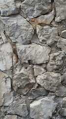 Fototapeta premium Rough Stone Wall Texture: A Rugged Concept