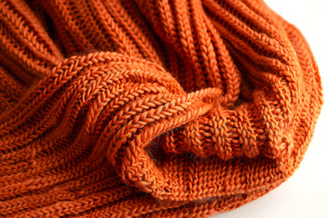 Orange knitted scarf isolated