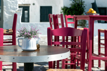 Tables and chairs of a cafe in Paros, Greece