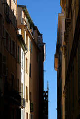 View up a narrow street in Nice, France