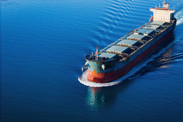 Bulk carrier or bulker underway in sea, ship for unpackaged bulk dry cargo