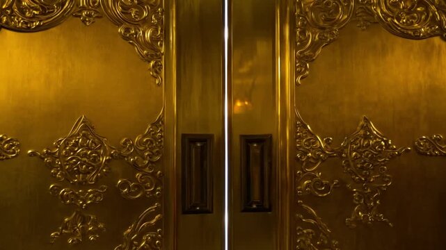 Going trough golden gate doors with bright heaven light shining. Open magic door with shining light. Gates to heaven with bright white clouds at the end concept 4k