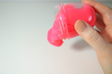 woman hands and slime toy, adult anti stress toy