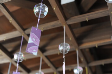 Colorful glass wind chimes (glass bells) hanging from the ceiling to chill hot temperature in summer in Japan