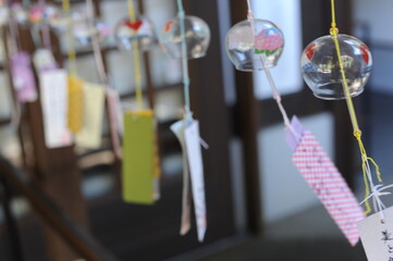 Colorful glass wind chimes (glass bells) hanging from the ceiling to chill hot temperature in summer in Japan