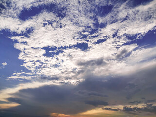Obraz premium clouds in the sky a man is standing on a hill with a kite flying, a view of the sky with clouds and a plane, a blue sky with clouds and a blue sky