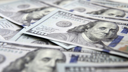 Close-up of cash American dollar bills. Concept nailed, finance and income.