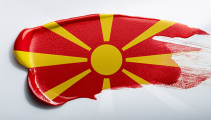 Obraz premium Paint stain in the colours of the Macedonian flag