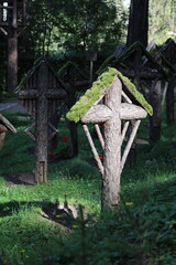 wooden crosses in the soldiers cemetery in the forest by Bruneck, alto adige Italy