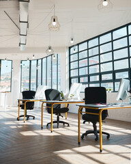 Table, chair and empty office interior with room, window and workspace with design, computer and...