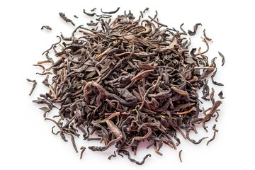 Fototapeta premium A pile of dried tea leaves on a white surface, great for photography or illustration projects