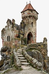 A stone building with a prominent tower, ideal for architectural or historical uses