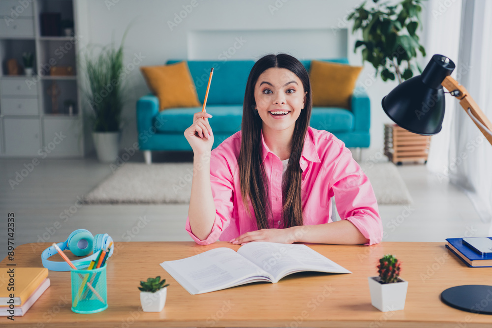 Sticker photo of excited cheerful lady wear pink shirt smiling writing copybook indoors room home house