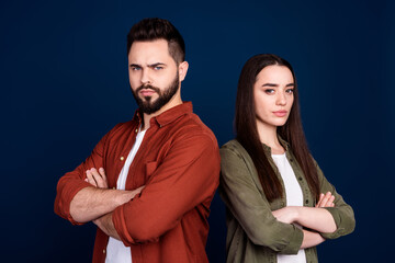 Photo of serious confident couple wife husband wear stylish clothes crossed arms isolated on dark blue color background