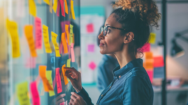 Professionals sharing ideas on a whiteboard during a workshop, creativity, collaboration