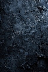 A detailed view of a worn-out black wall with flaking paint, suitable for use in architectural or urban-themed projects
