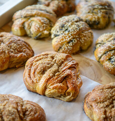 Delicious pastries on a bakery table. Freshly baked pastries.