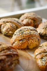 Delicious pastries on a bakery table. Freshly baked pastries.