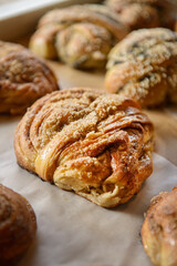 Delicious pastries on a bakery table. Freshly baked pastries.