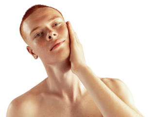 Portrait of young red-haired man posing shirtless against transparent background. Freckled face. Concept of men's health, lifestyle, beauty, body and skin care. Model looking at camera