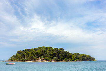The island of Spilja Grotta, near the Istrian town of Rovinj, Croatia, Europe, space for text, blue summer sky