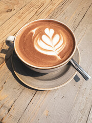 Cup Of Coffee With A Motive On The Top