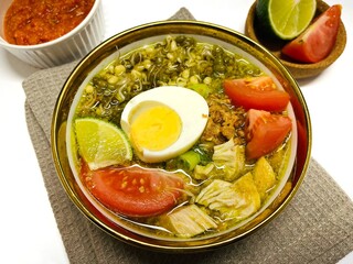 Chicken Soto or Soto Ayam in Indonesia. Soto ayam is a traditional Indonesian dish which uses ingredients such as chicken, vermicelli, bean sprout with turmeric as main ingredient add in the broth.