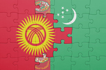 puzzle with the colourful national flag of kyrgyzstan and flag of turkmenistan .