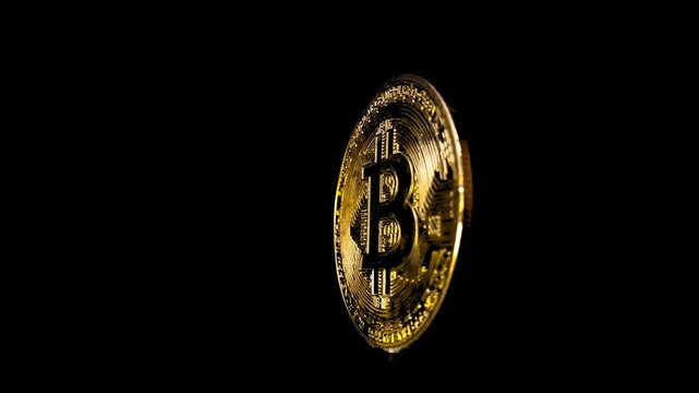 Bitcoin spinning on a black background