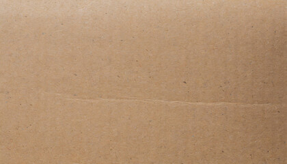 Close-Up of Brown Recycled Cardboard Texture with Natural Fiber Specks and Creases, Ideal for Eco Friendly Packaging, Crafting, and Design Backgrounds