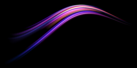 Neon color glowing lines background, high-speed light trails effect. Modern abstract high-speed light motion effect on black background. Light motion effect, slow shutter of traffic.