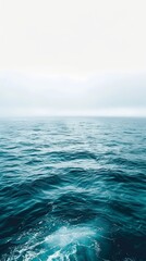 Fototapeta premium Deep blue ocean waves with white foam