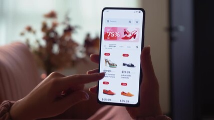 Shopping online for shoes. Sale with great discounts and special offers. Scrolling through a catalog of shoes. Fictional interface.