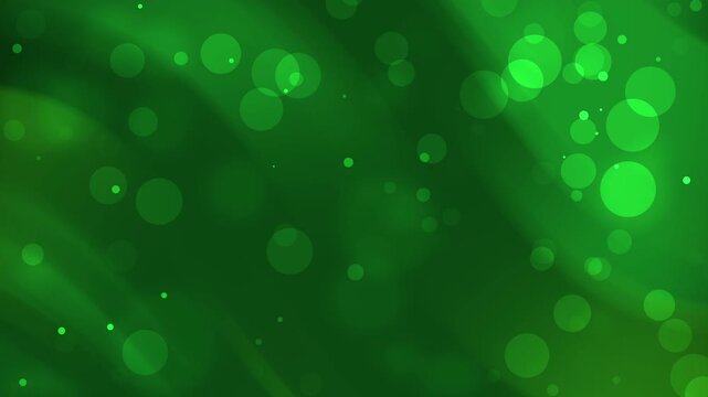 Abstract blurred and beautiful bokeh motion design in Green. Soft glitter seamless loop