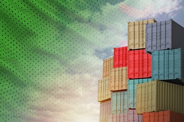 Zambia flag and big stack of shipping cargo containers in docks with sky background close up
