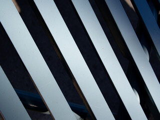 Blue, and green colored metal strips, macro photo, surface texture