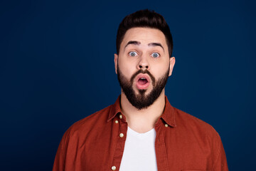 Photo of excited glad cheerful nice man wear trendy clothes isolated on dark blue color background