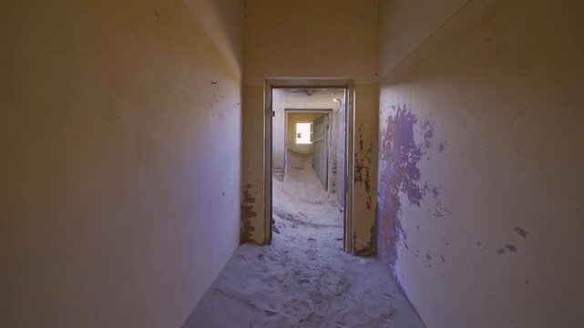 Kolmanskop, The abandoned houses. the famous tourist attraction in Namibia, South Africa. Empty sand dune in home room . The ghost town.