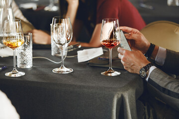 Sommelier school. Professional wine waiters are trained, close up. Winemaking courses, wine tasting. 