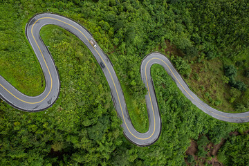 Road on mountain which a lot of road curve very popular landmark for tourist in Nan province,...