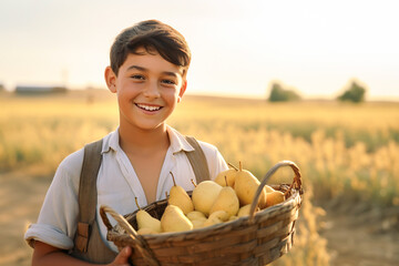 Latin American boy smiling and holding basket with pears after harvesting them