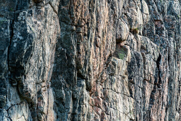 closeup of a rocky wall of mountain in andalsnes rauma region in norway in the sunset light