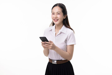 Portrait pretty Asian student girl in Thai university uniform using mobile app on smart phone isolated on white background.