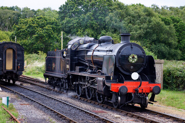 Steam Train on the Swanage Railway at Corfe Castle in Dorset UK