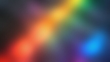 Obraz premium Colorful spectrum background. Abstract background with vibrant hues of a color spectrum fading into a dark backdrop.