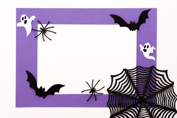 Halloween mockup template with purple frame, bats, scary ghosts and spiders and spider web on white background