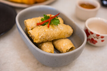 Fried soybean rolls in bowl