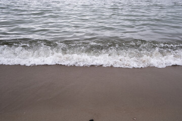 Sea wave on the sandy beach. Sea wave on the sandy beach.